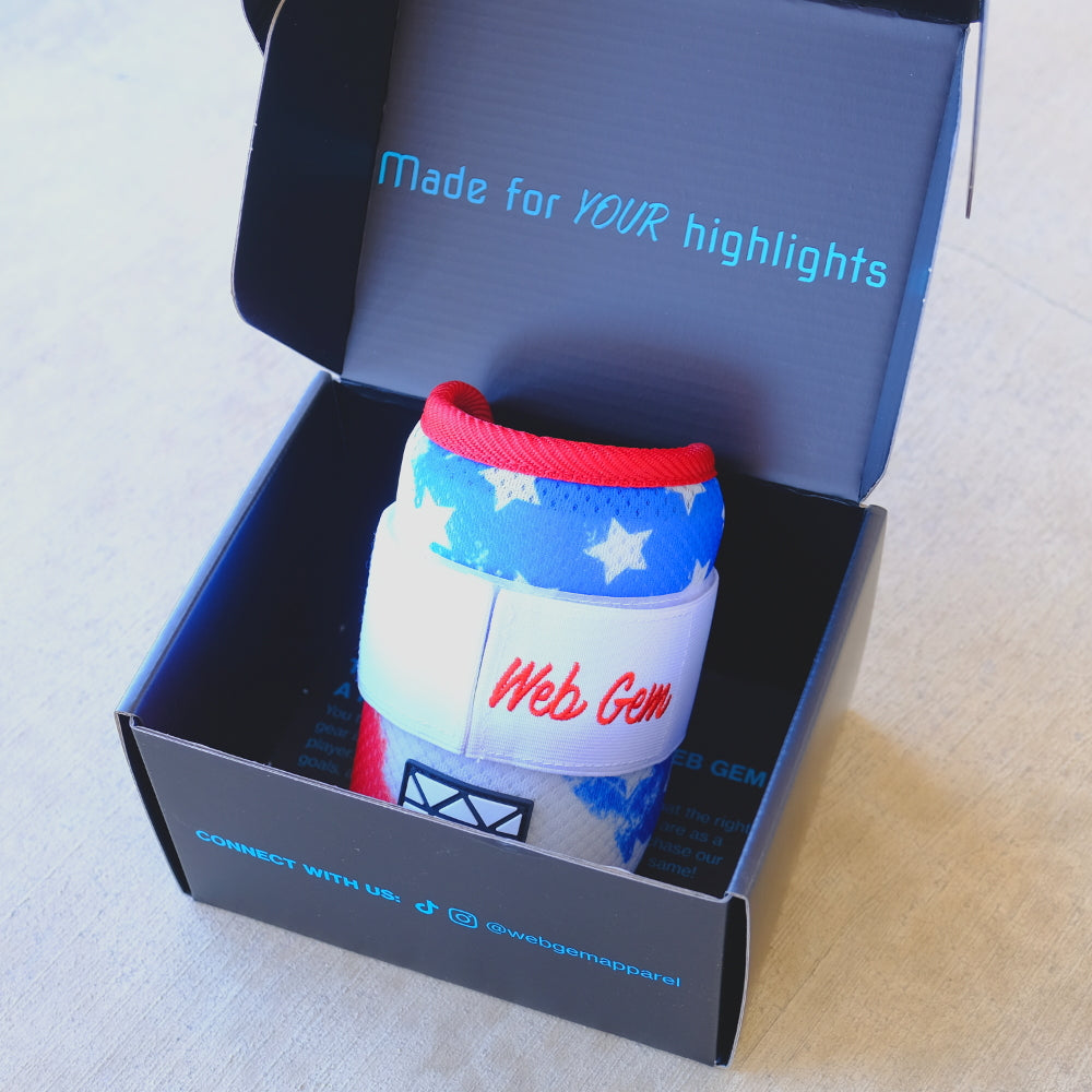 The Liberty Bomb Baseball Elbow Guard displayed in it's glossy box