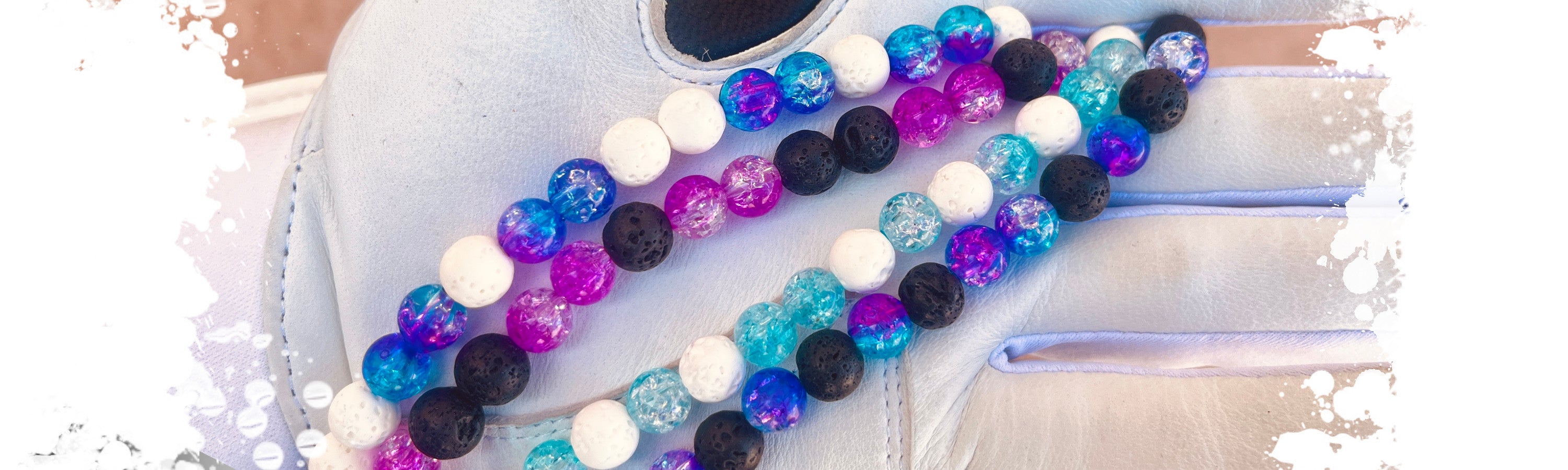 Various colorways from the Web Gem Apparel Baseball Necklace collection, showcasing the authentic lava rocks and premium ice beads built for game-day and high-intensity baseball performance.