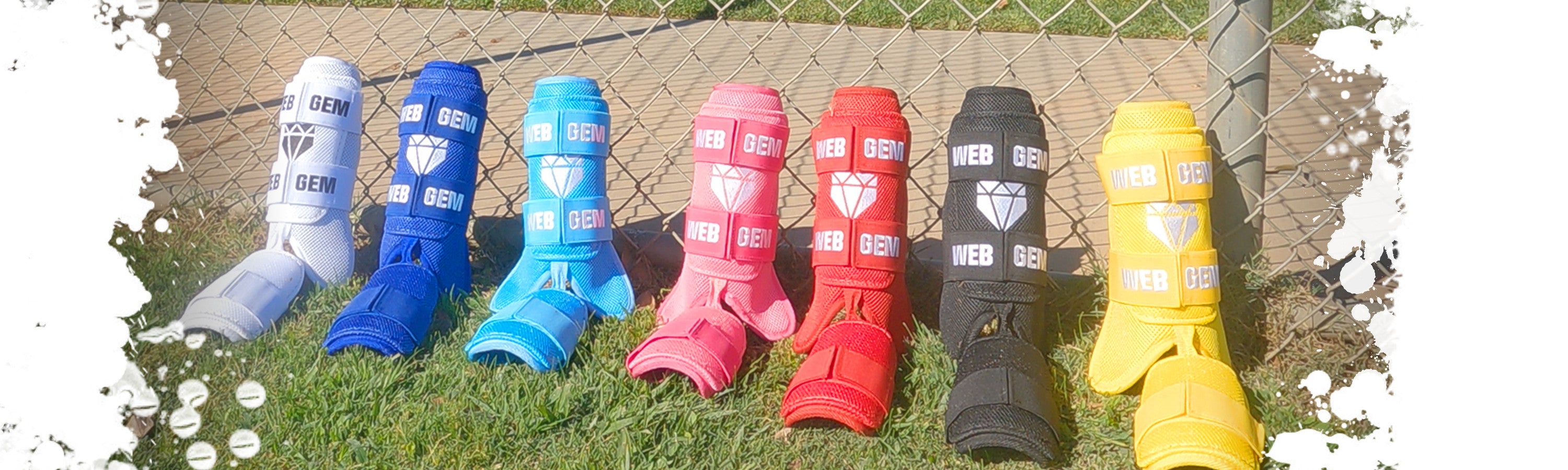 A variety of Web Gem Apparel baseball leg guards on display, showing different colors like Moonshot White, Barrel Blue, Bat Flip Baby Blue, Pimp Job Pink, Raking Red, Bomb Black, and Going Yard Yellow.