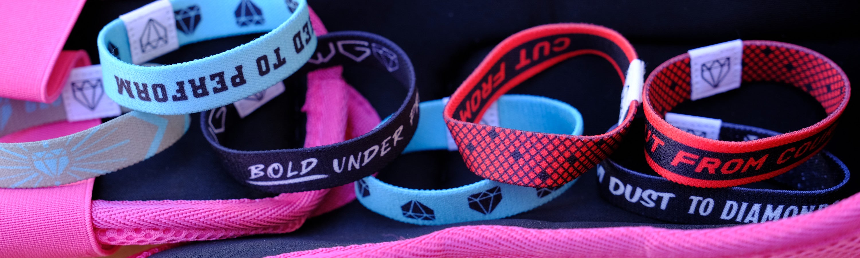 Various colorways and styles of game-ready baseball wristbands from Web Gem Apparel.