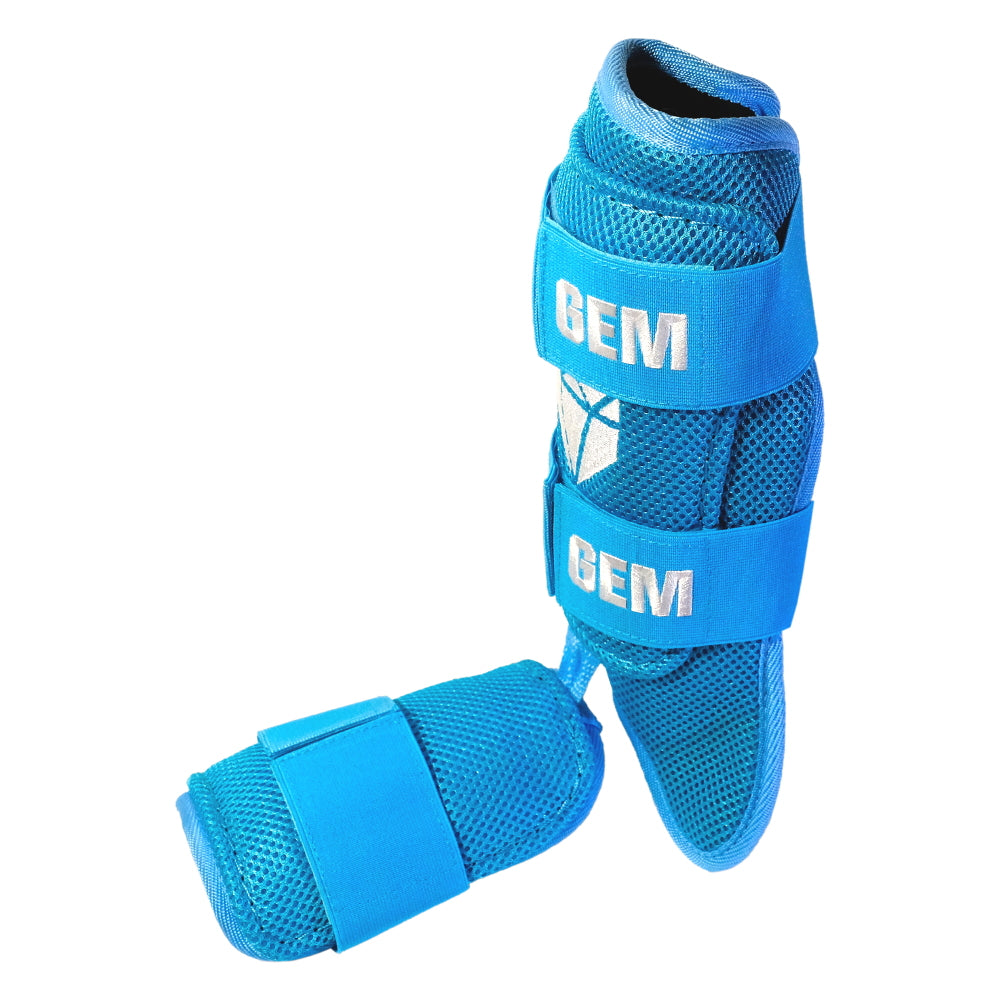 Back view of Bat Flip Baby Blue Baseball Leg Guard showing adjustable Velcro strap and ergonomic design