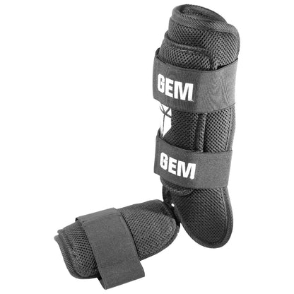 Back view of Bomb Black Baseball Leg Guard showing adjustable Velcro strap and ergonomic design
