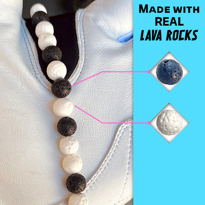 Close-up of white and black lava rocks on the hand crafted baseball accessory.