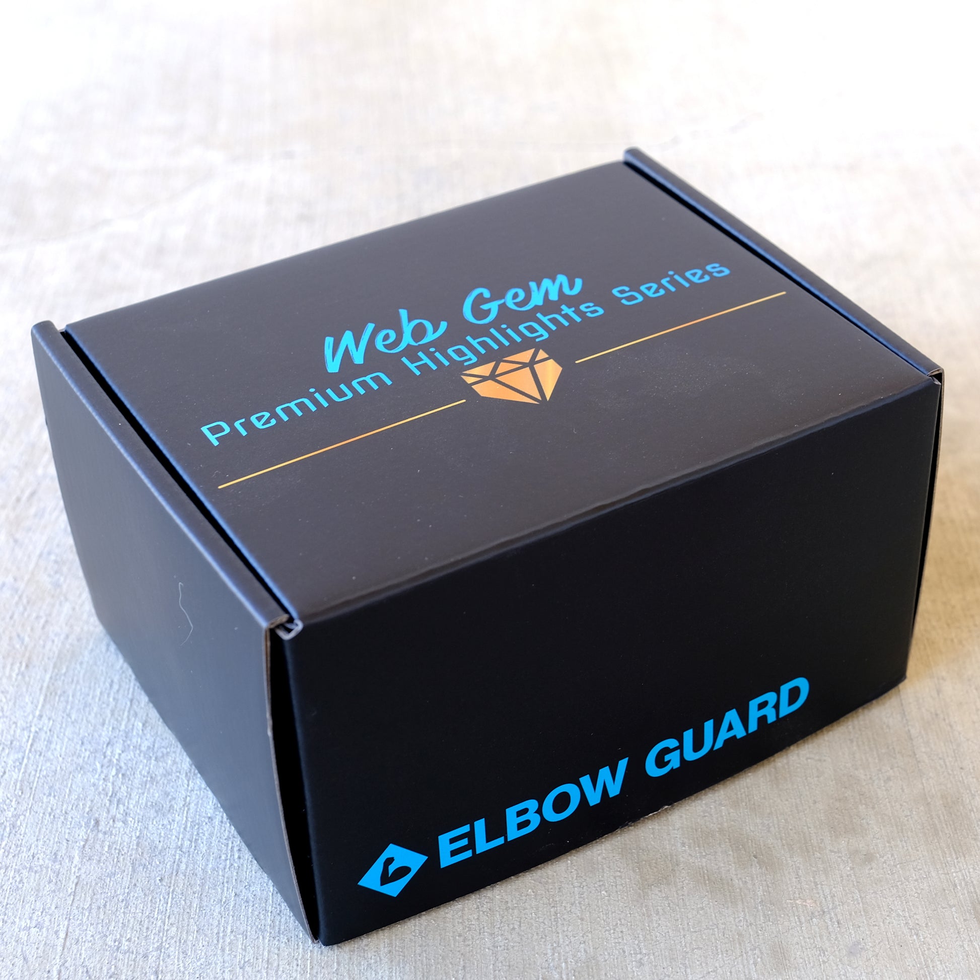 Box view of Liberty Bomb Baseball Elbow Guard showing the premium reusable gear storage