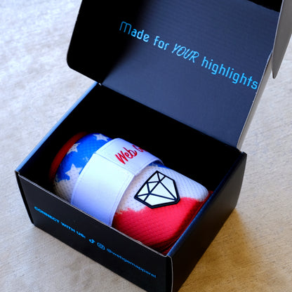 The Liberty Bomb Baseball Elbow Guard packaged inside the box, showing Made for Your Highlights branding
