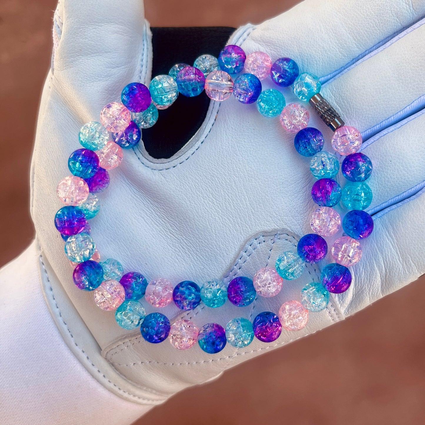 Glamour shot of Miami Nights Necklace featuring blue, pink, and nebula ice beads.