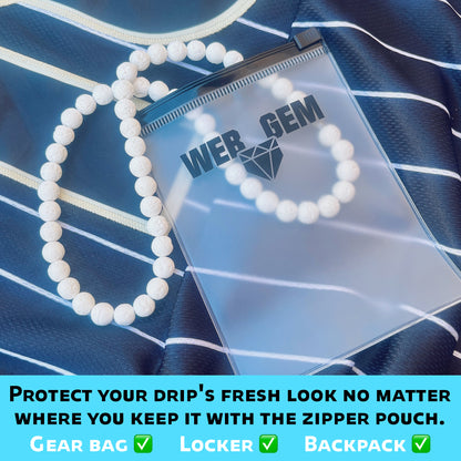 Moonshot inside the reusable zipper bag with Web Gem Apparel logo for storing game-day drip.