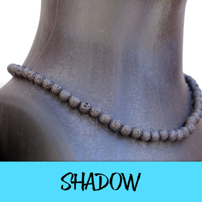 Shadow Baseball Necklace with black lava rocks designed for players.