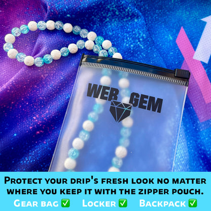 Snowball inside the reusable zipper bag with Web Gem Apparel logo for storing game-day drip.